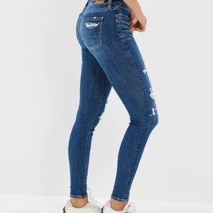 American Eagle Super Stretch Blue Wash Denim Jeans Covered Holes Rips Raw Hem
